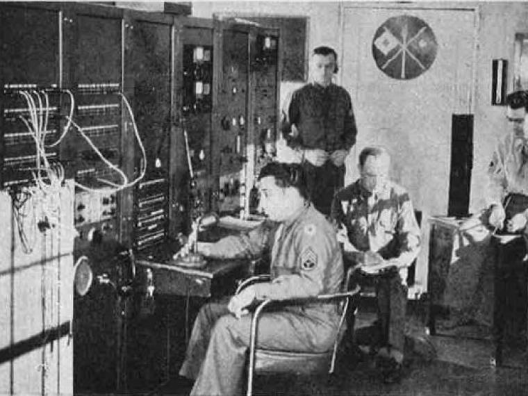 phone switch room with men
